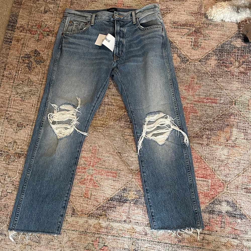 KHAITE ripped jeans